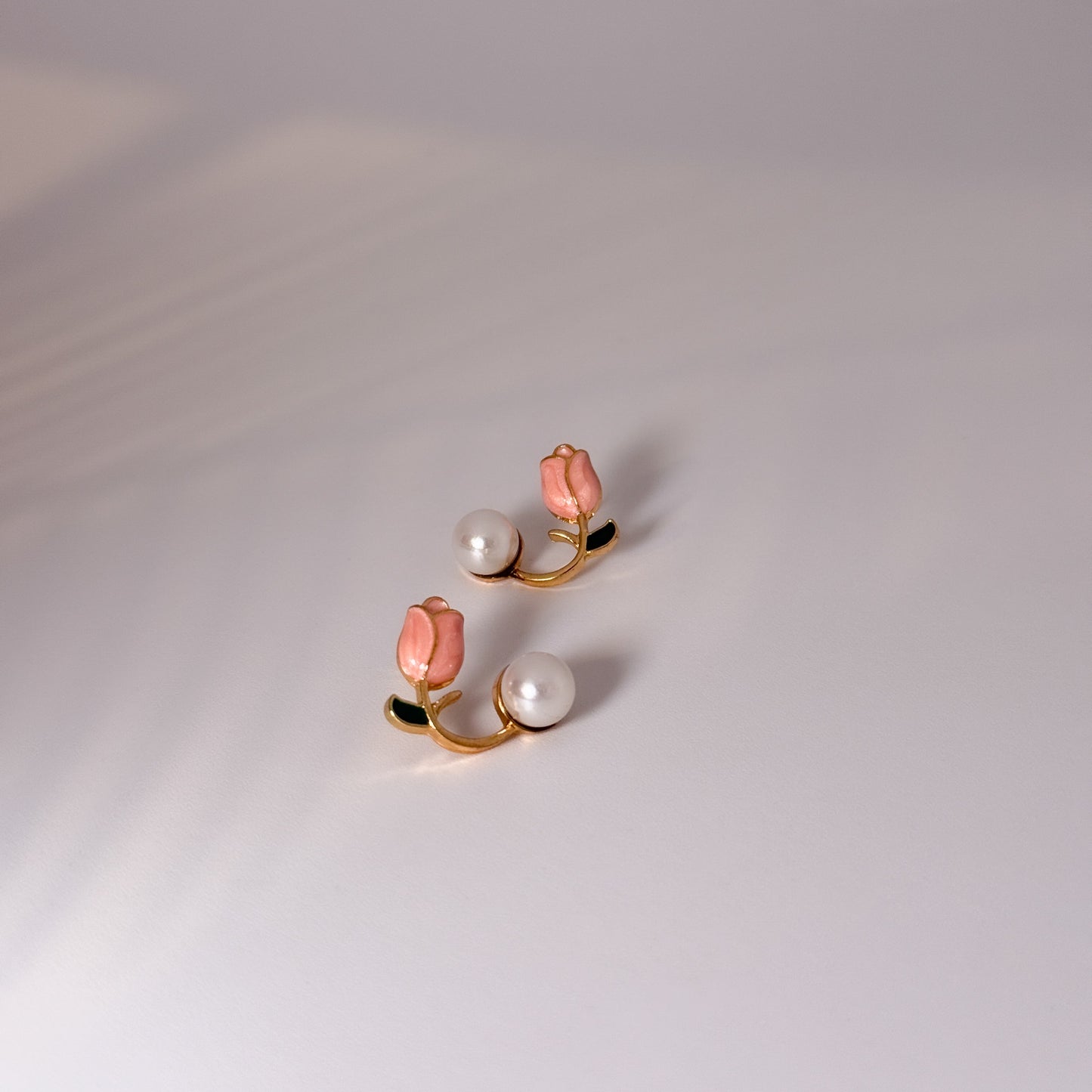 Pearly golden with peach bud earrings for a modest look