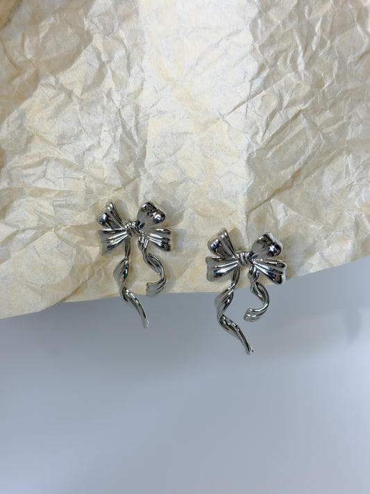 Simple silver bow-shaped earrings, modern minimal jewelry