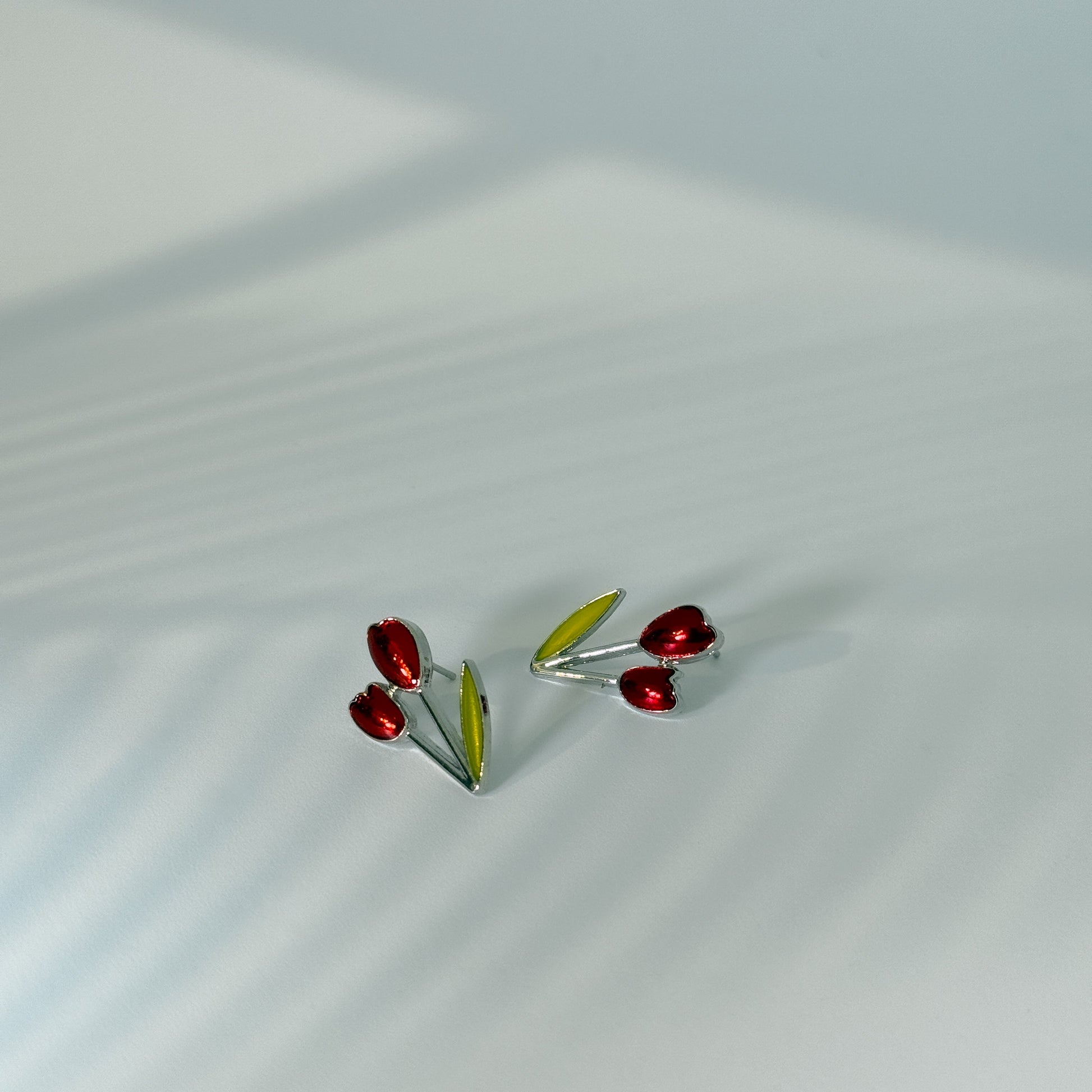 dainty, Pair of red tulip-shaped earrings on a daily chic style