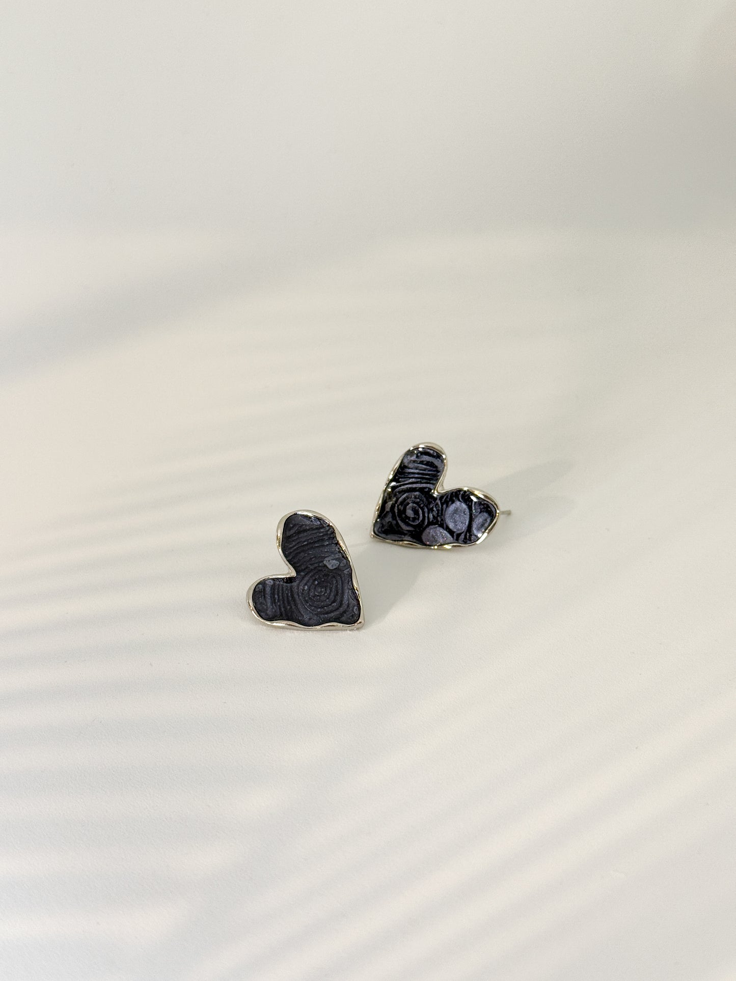 Daily wear, Heart-shaped gray textured art stone stud earrings with silver outline, minimal design