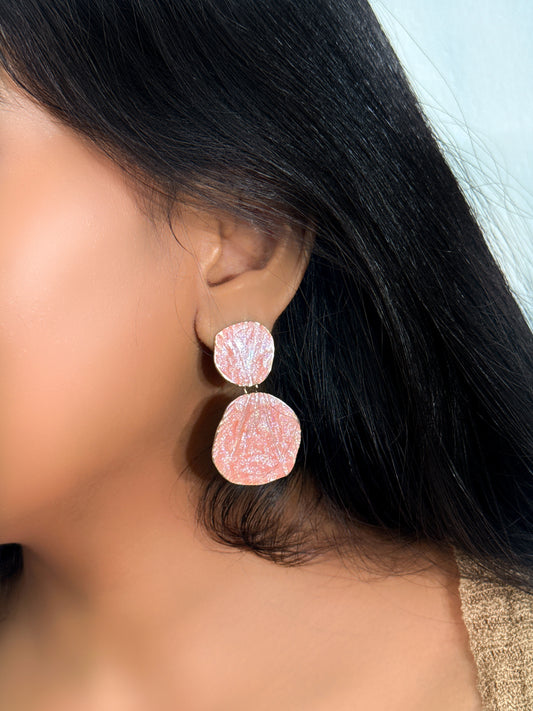 Elegant styling with minimal statement earrings
