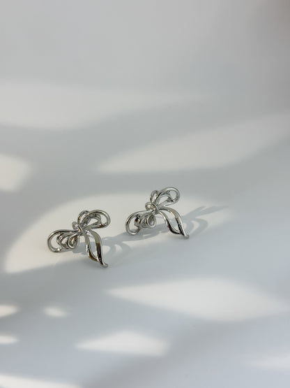 Simple silver bow-shaped earrings, modern minimal jewelry