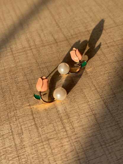 sunset look of a peach bud in golden metal