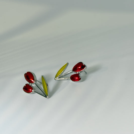 Daily wear, Pair of tulip-shaped earrings with red centers and silver stems