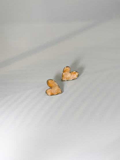 Minimal beige stud earrings for everyday wear