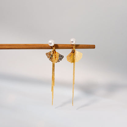 Golden Bold party wear earrings with textured design in pearl look
