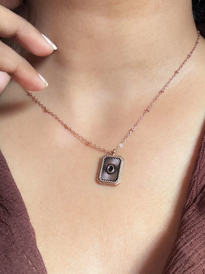 Anti Tarnish Necklace with a square pendant featuring an eye design on a person's neck | Minukki