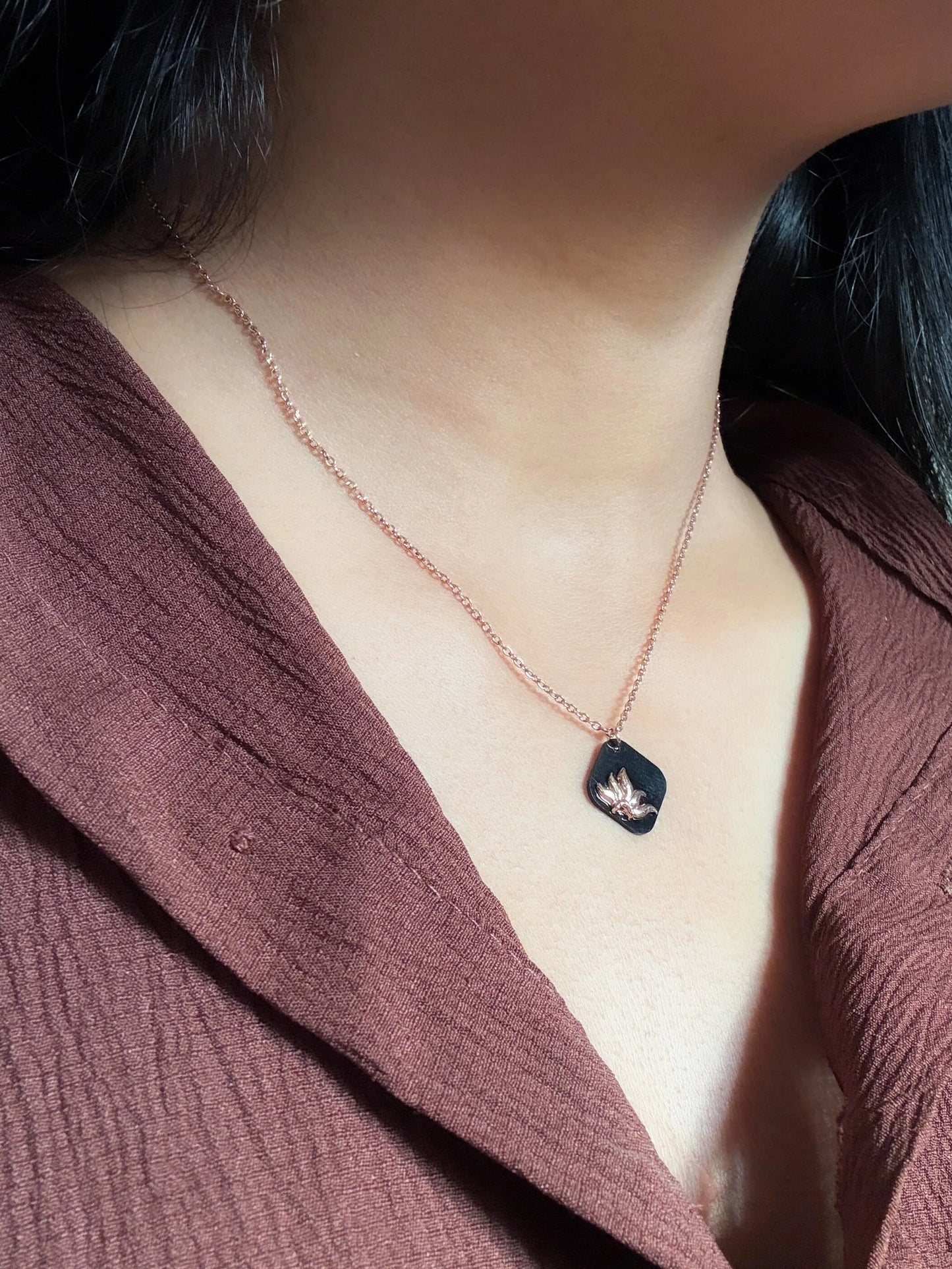 Anti Tarnish Necklace with a pendant worn by a person in a brown top