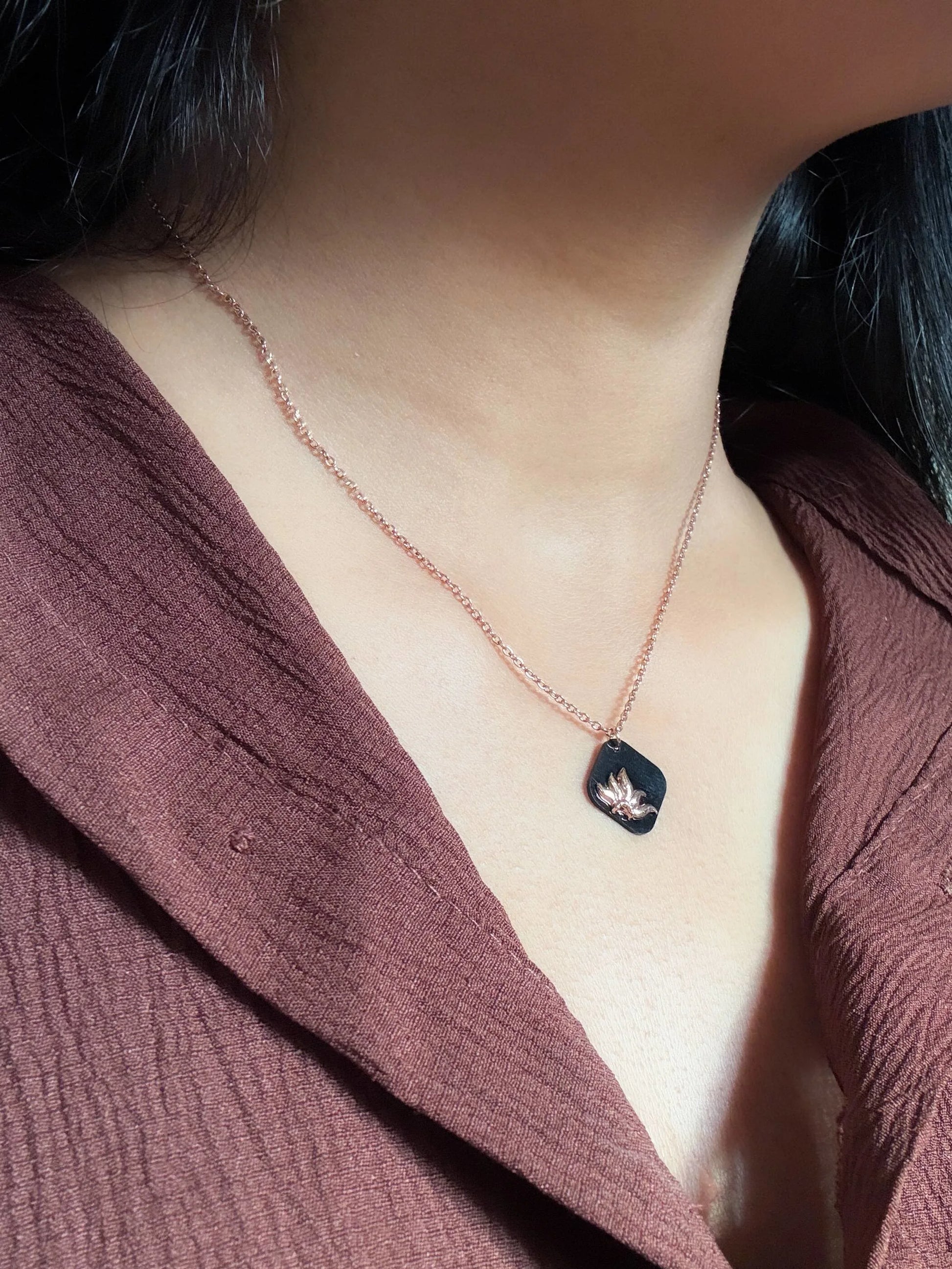 Anti Tarnish Necklace with a pendant worn by a person in a brown top